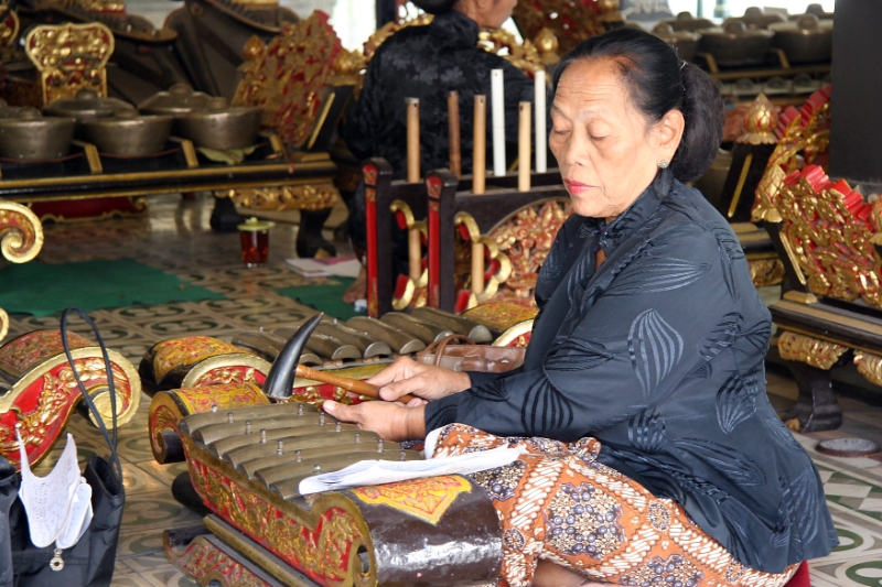 Playing the gamelan in the sultan's palace, Java Yogyakarta Indonesia 1.jpg - Indonesia Java Yogyakarta. Playing the gamelan in the sultan's palace